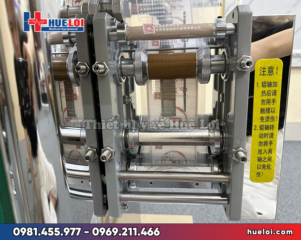 Máy sắc thuốc kèm đóng túi tự động YJCL20/1+1(S) -trục ép đóng túi