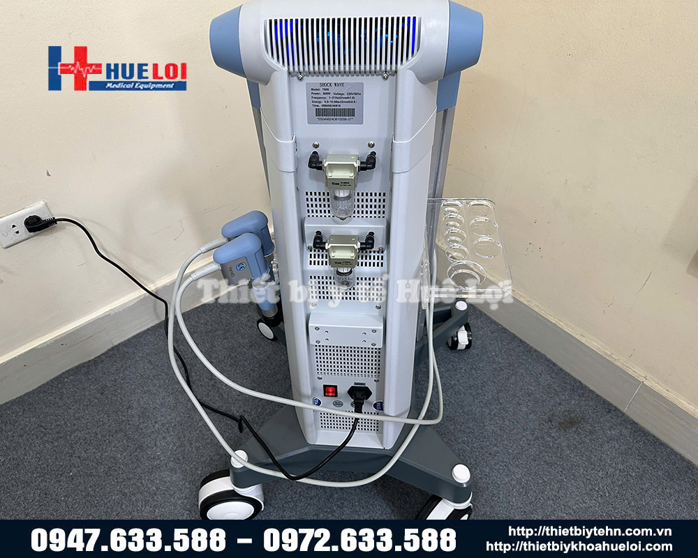 mặt sau máy xung kích trị liệu